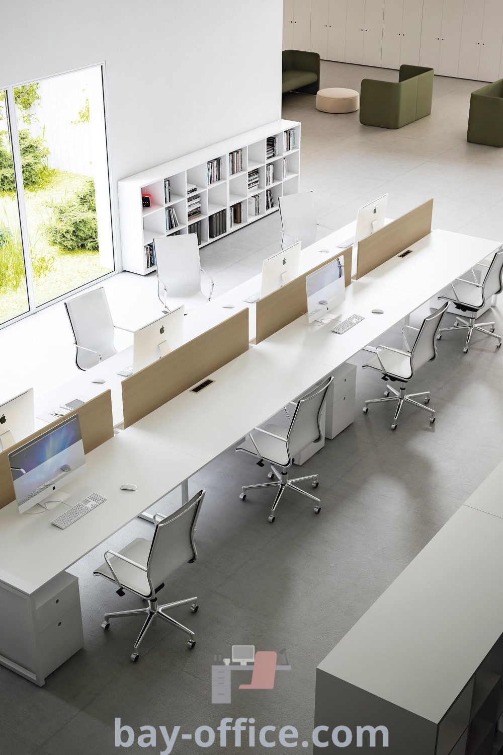 Modern office space with desks, chairs, and open bookshelves, showcasing minimalist office design ideas and corporate interior design inspiration, perfect for enhancing productivity. Explore more at bay-office.com.