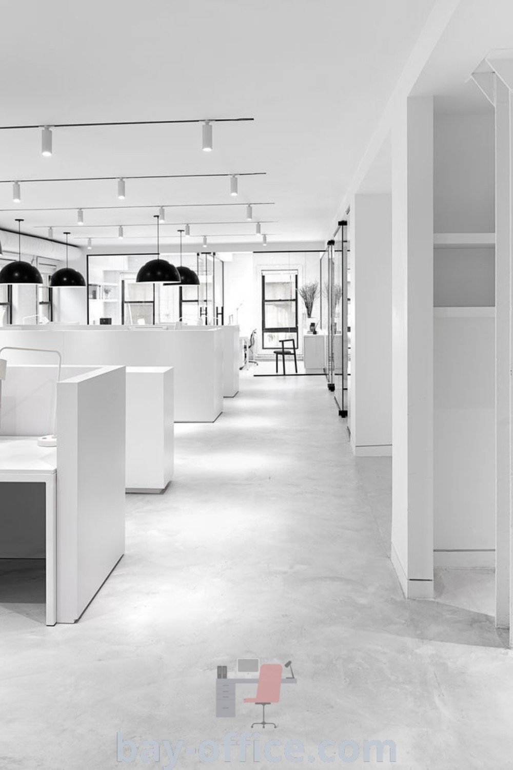 All white office with white desks and black lamps showcasing a minimalist design, perfect for modern workspaces. Explore inspiring office interior design ideas and decorating trends at bay-office.com.
