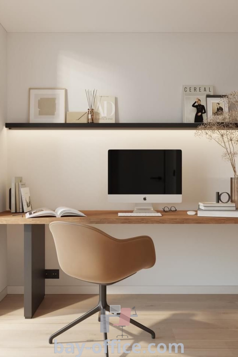 A cozy Japandi home office featuring a desk with a computer and a bookshelf in the background, showcasing minimalist decor and office vibes. Discover design tips and ideas for small spaces, enhancing productivity and comfort at bay-office.com.