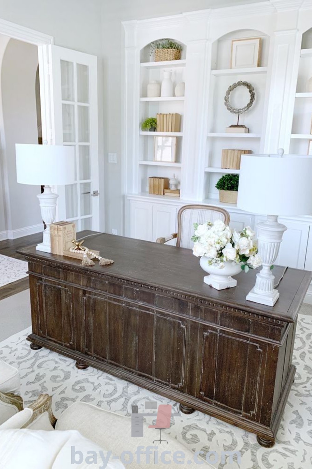 Cozy French Country office with wooden table, flowers, and furniture, designed to enhance productivity and inspire creativity. Explore decor ideas for small spaces and discover the best design trends at bay-office.com.