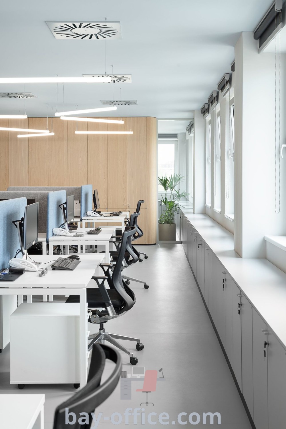 Empty office interior with multiple desks and chairs, showcasing open office design elements, luxurious meeting space, and inspiring decor ideas for small spaces. Explore office interior design trends at bay-office.com.