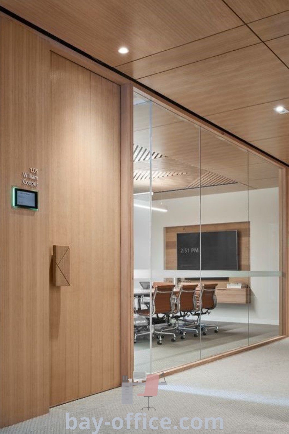 Meeting room with glass walls and wood paneling, showcasing modern office interiors, office design inspiration, and functional decor ideas that inspire productivity. Discover dreamy office meeting room design trends at bay-office.com.