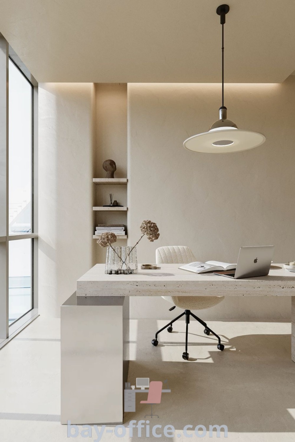 A white table with a laptop on top in front of large glass windows represents a light and airy office design. The minimalist modern setup combines cozy aesthetics with functionality, making it an inspiring workspace that encourages productivity. Explore design trends and decorating ideas at bay-office.com.