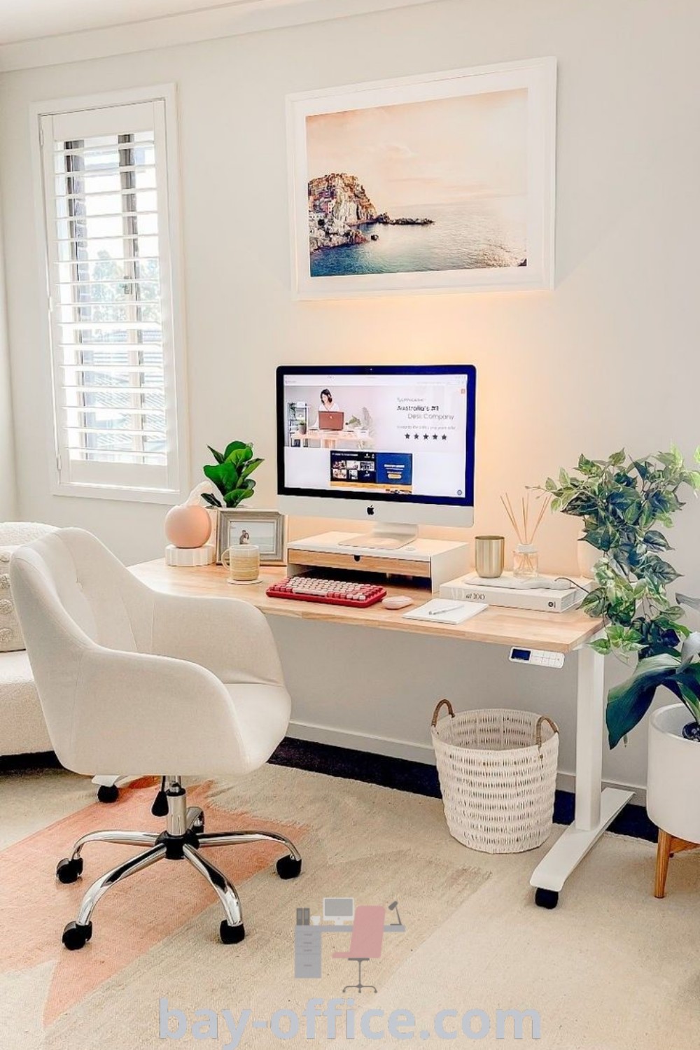 Stylish standing home office with a desk, computer, chair, and a potted plant, showcasing cozy aesthetic decor ideas for small spaces that inspire productivity. Discover more inspiration and home office tips at bay-office.com.